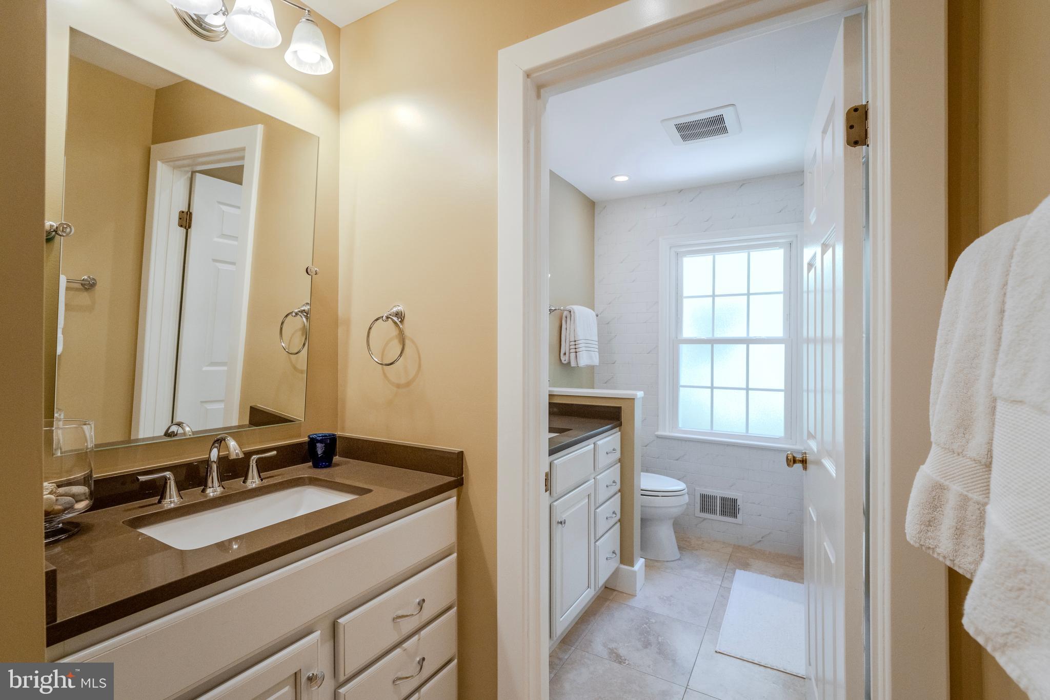 11910 Winstead Lane Reston, VA 20194 - Photo 34 of 80 Hall Bathroom
