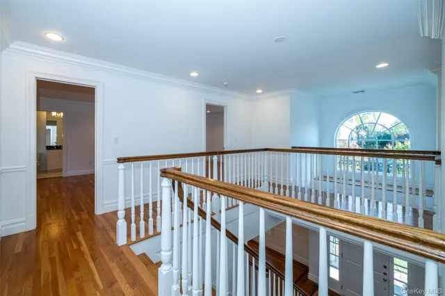 a view of staircase with large window