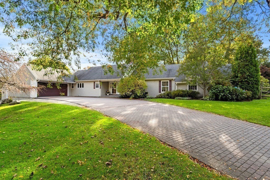 22 Arrowhead Road Marblehead, MA 01945 - Photo 1 of 34 a front view of a house with yard and green space