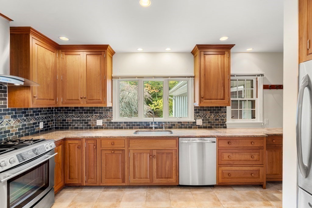 22 Arrowhead Road Marblehead, MA 01945 - Photo 11 of 34 a kitchen with a sink stove and cabinets