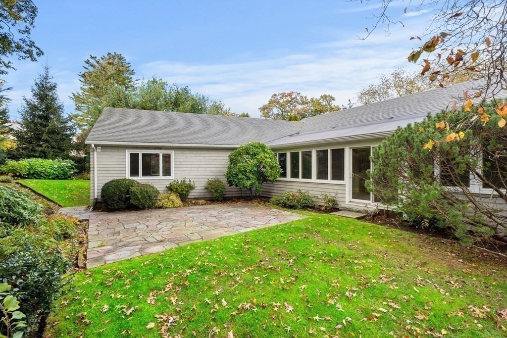 22 Arrowhead Road Marblehead, MA 01945 - Photo 24 of 34 a front view of a house with a garden