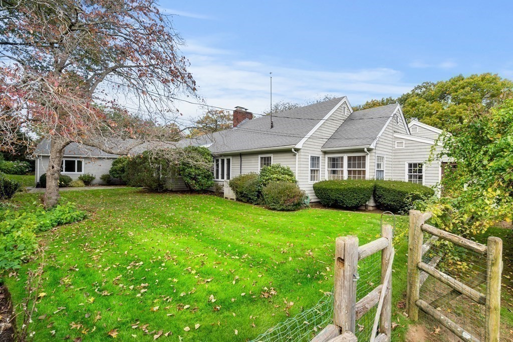 22 Arrowhead Road Marblehead, MA 01945 - Photo 25 of 34 a front view of a house with a yard