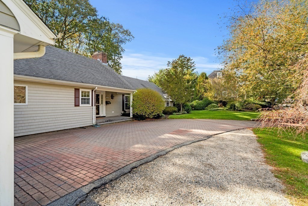 22 Arrowhead Road Marblehead, MA 01945 - Photo 29 of 34 a view of a house with a yard and garage