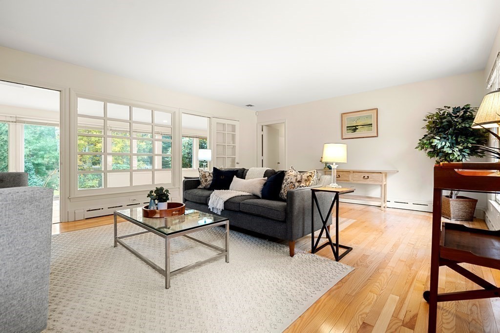 22 Arrowhead Road Marblehead, MA 01945 - Photo 3 of 34 a living room with furniture and a floor to ceiling window