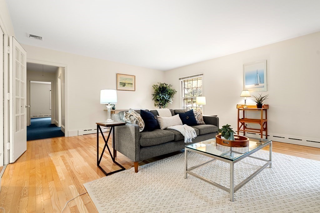 22 Arrowhead Road Marblehead, MA 01945 - Photo 4 of 34 a living room with furniture and a wooden floor