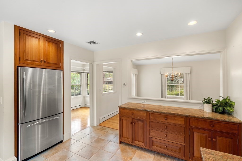 22 Arrowhead Road Marblehead, MA 01945 - Photo 10 of 34 a kitchen with stainless steel appliances granite countertop a refrigerator and a sink
