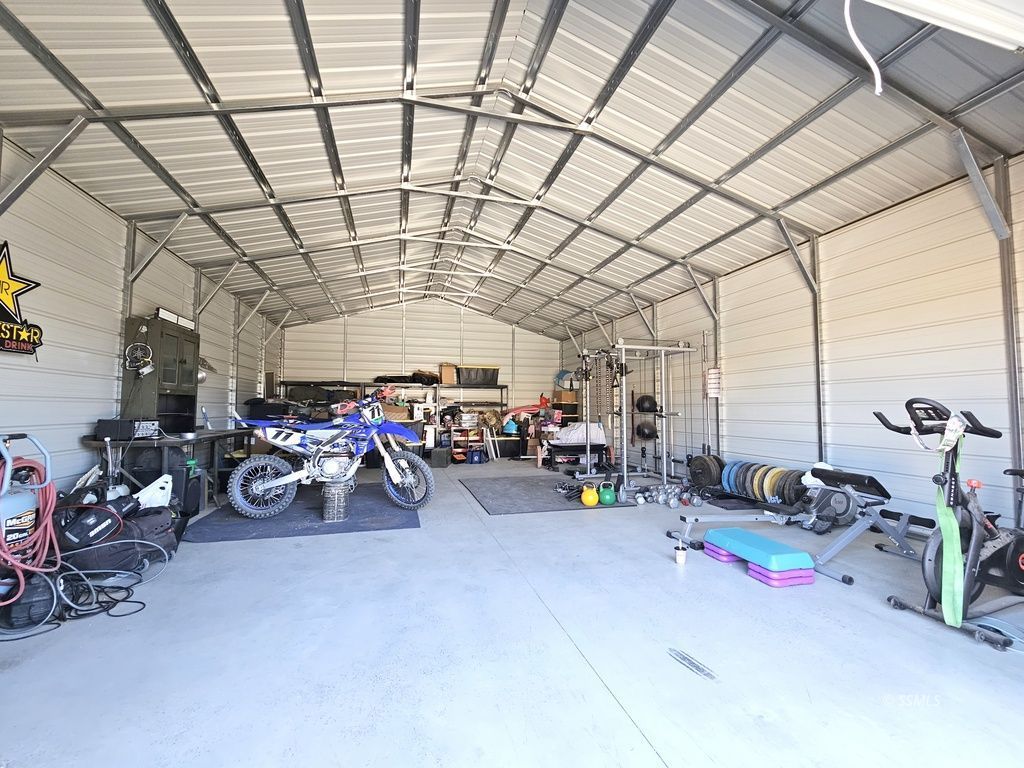 630 South Sunset Street Ridgecrest, CA 93555 - Photo 22 of 34 a view of parking garage with cars
