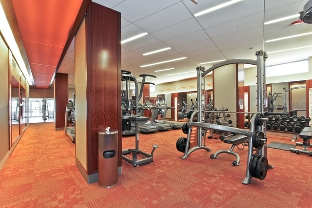 400 East Randolph Street, Unit 1924 Chicago, IL 60601 - Photo 16 of 18 a view of a room with gym equipment