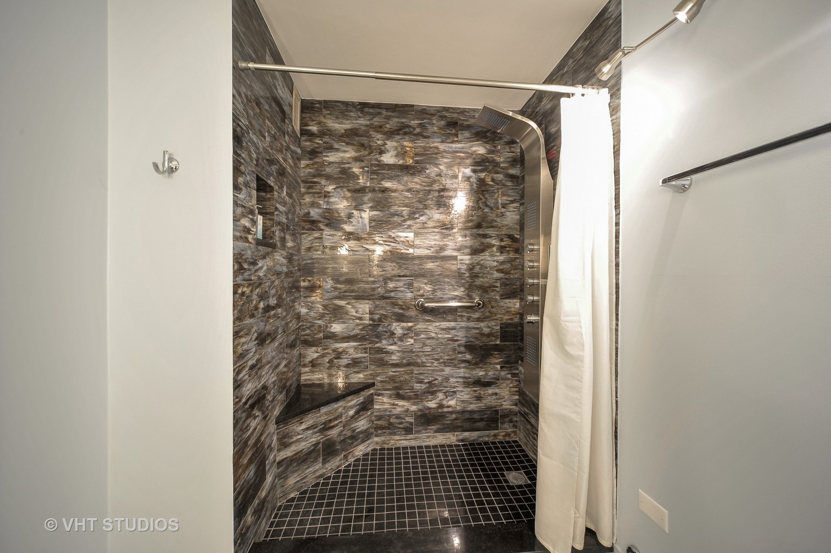 400 East Randolph Street, Unit 1924 Chicago, IL 60601 - Photo 8 of 18 a bathroom with a shower and a toilet
