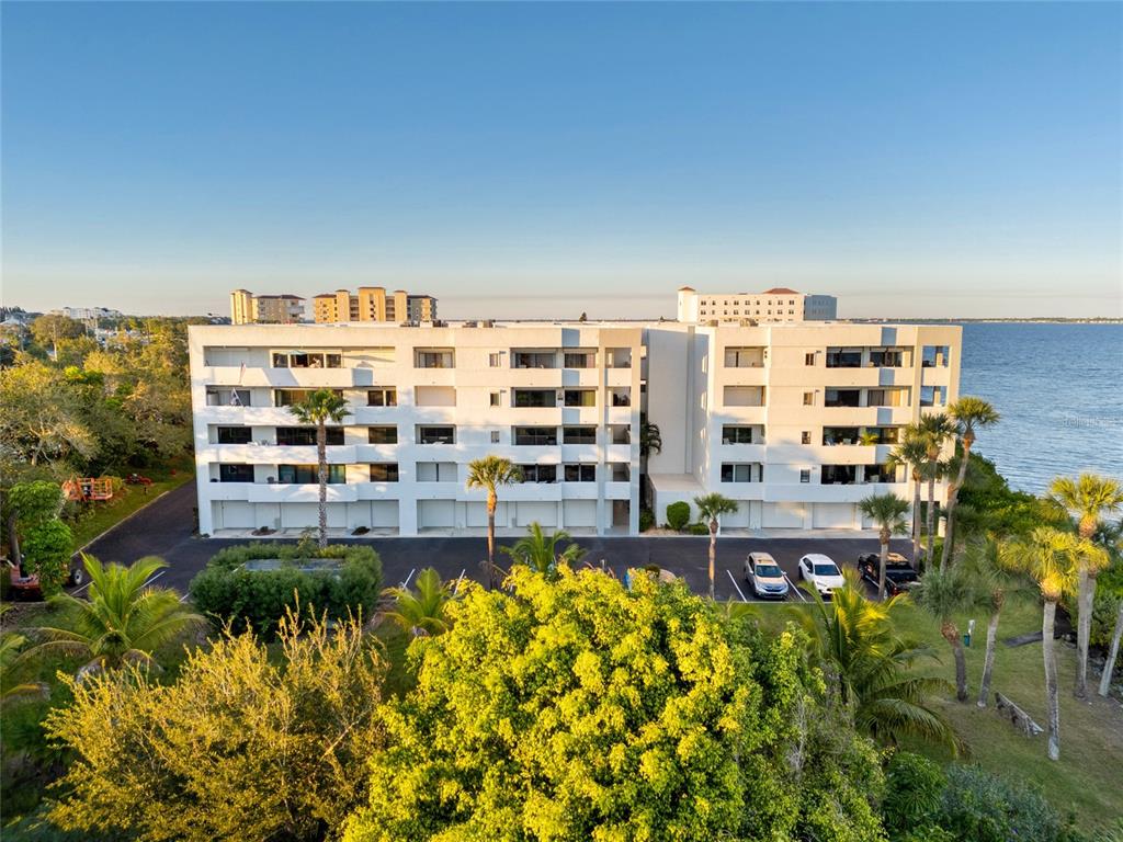 5055 Dixie Highway Northeast, Unit B206 Palm Bay, FL 32905 - Photo 1 of 30 a view of building with outdoor space