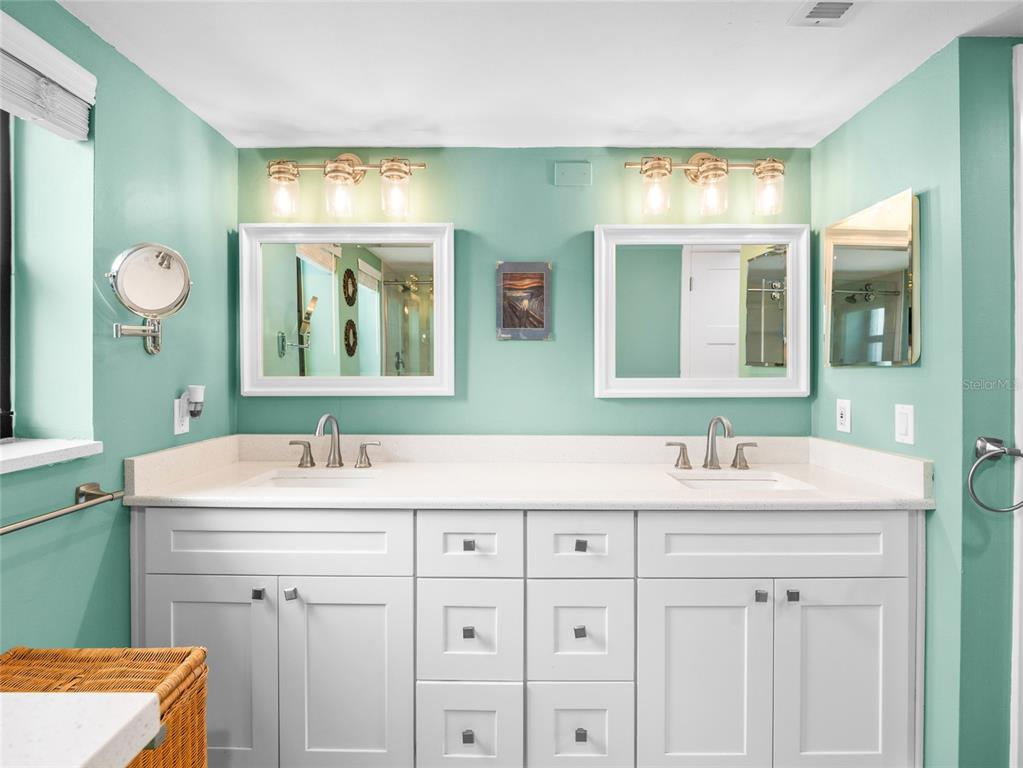 5055 Dixie Highway Northeast, Unit B206 Palm Bay, FL 32905 - Photo 14 of 30 a bathroom with a sink and a mirror