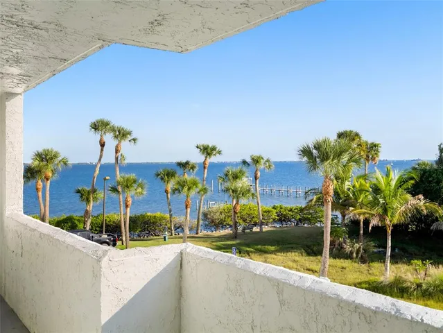 a view of a house with outdoor space and sitting area