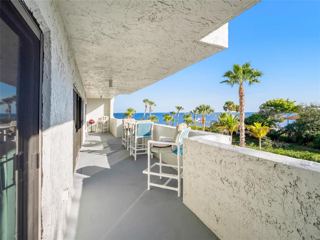 5055 Dixie Highway Northeast, Unit B206 Palm Bay, FL 32905 - Photo 20 of 30 a dining room with furniture and a potted plant