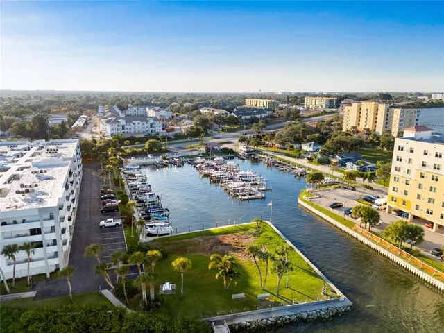 an aerial view of houses with outdoor space