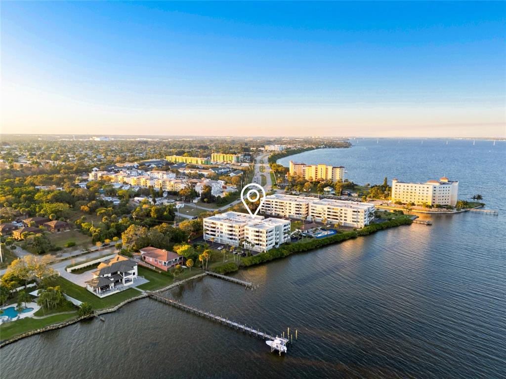 5055 Dixie Highway Northeast, Unit B206 Palm Bay, FL 32905 - Photo 29 of 30 an aerial view of residential houses with outdoor space