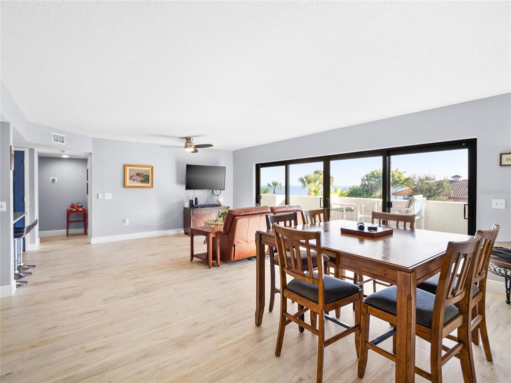 5055 Dixie Highway Northeast, Unit B206 Palm Bay, FL 32905 - Photo 4 of 30 a dining room with furniture and window