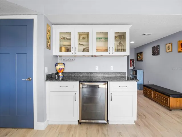a kitchen with stainless steel appliances granite countertop a stove and a sink