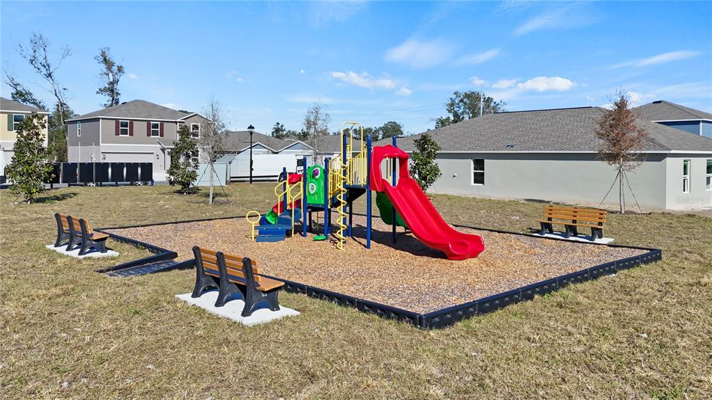 1394 Inkberry Circle DeLand, FL 32720 - Photo 26 of 26 a view of a house with a swimming pool and sitting area