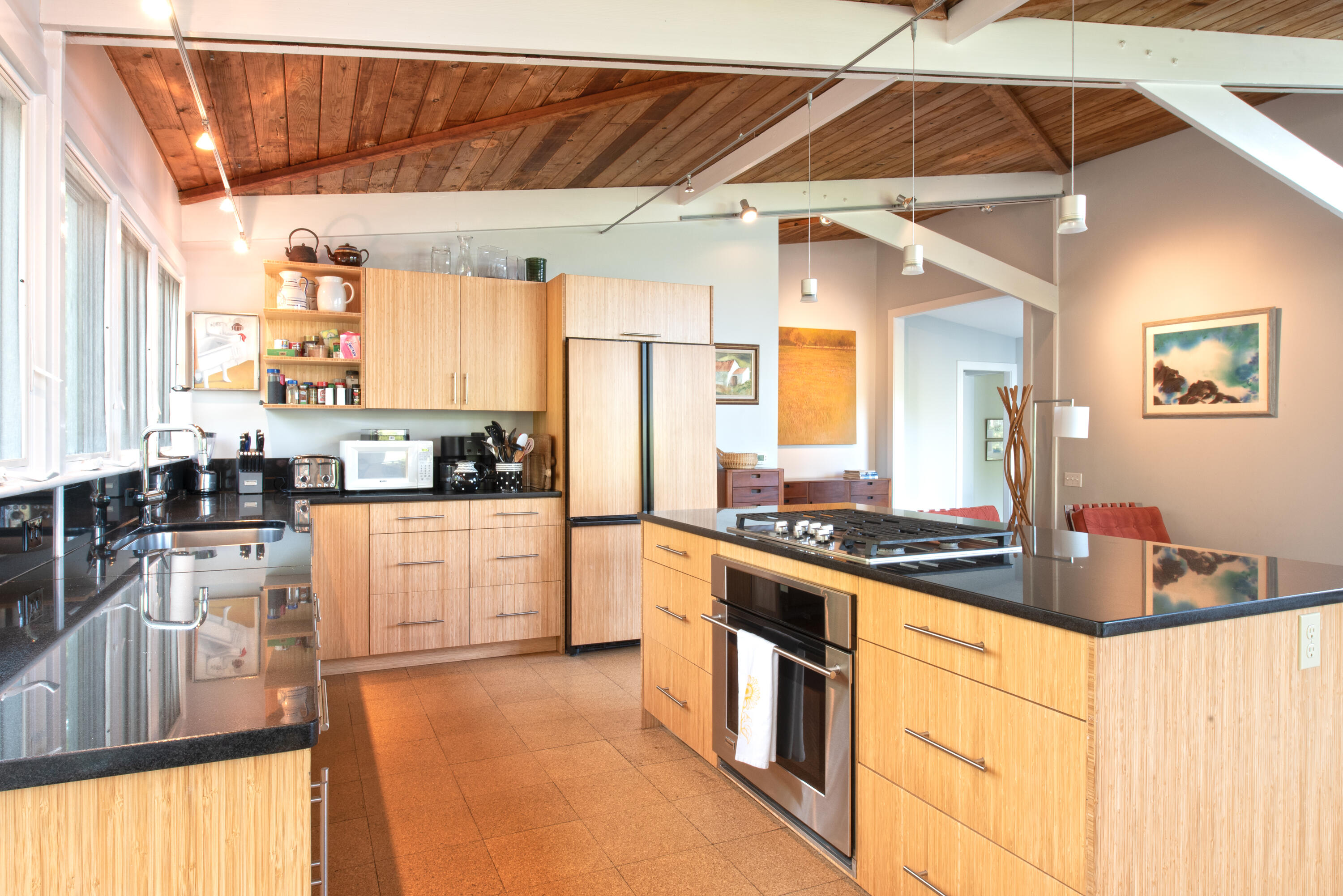 30 Gulch Road Wellfleet, MA 02667 - Photo 17 of 41 a kitchen with stainless steel appliances granite countertop a stove a sink and a refrigerator