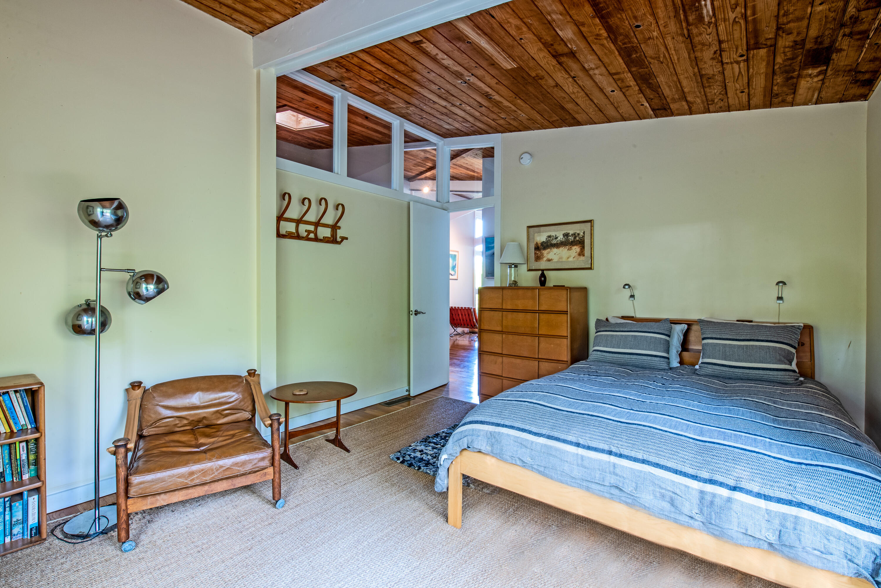 30 Gulch Road Wellfleet, MA 02667 - Photo 19 of 41 a bedroom with furniture and a chair