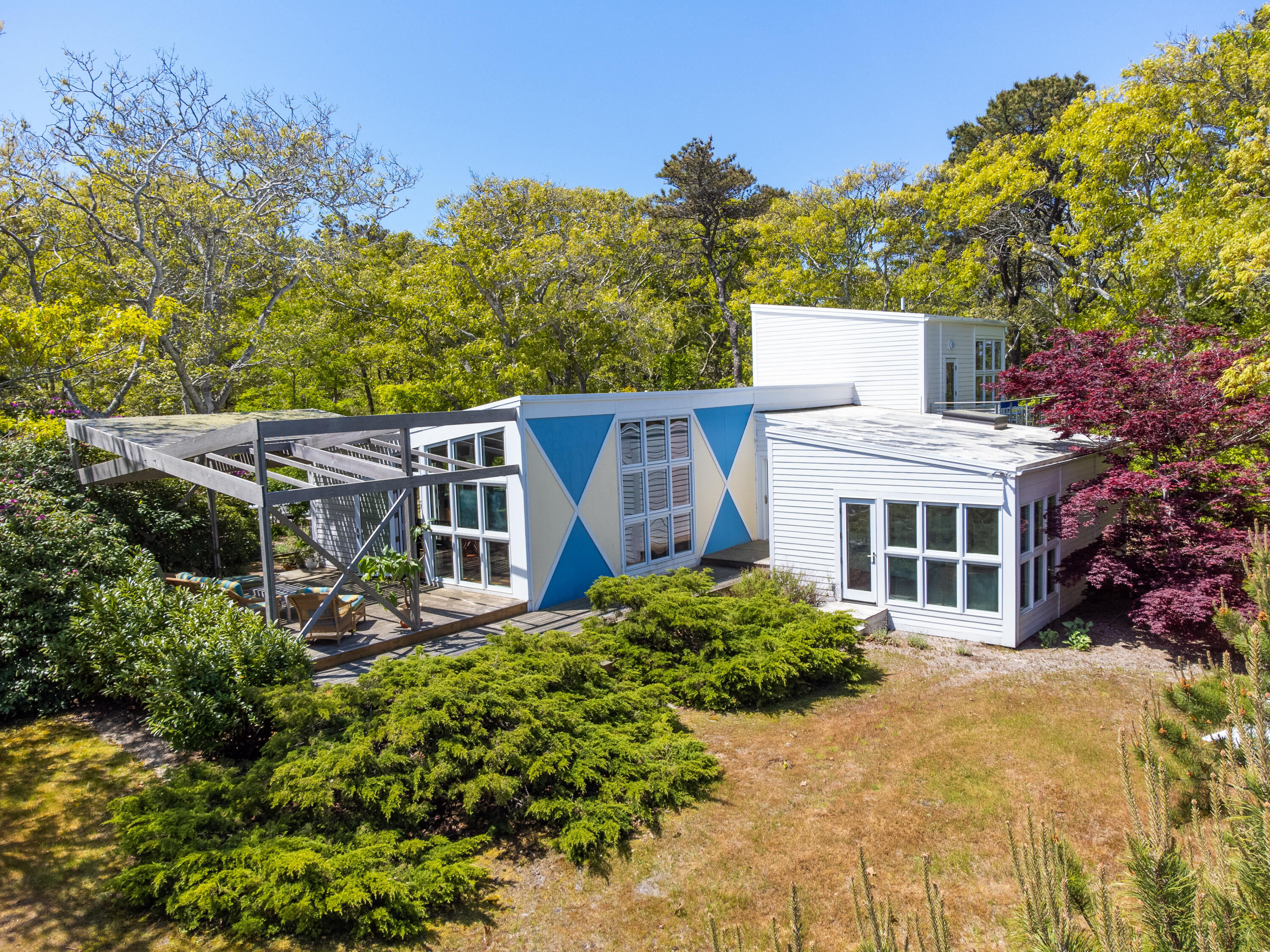 30 Gulch Road Wellfleet, MA 02667 - Photo 2 of 41 front view of a house with a garden