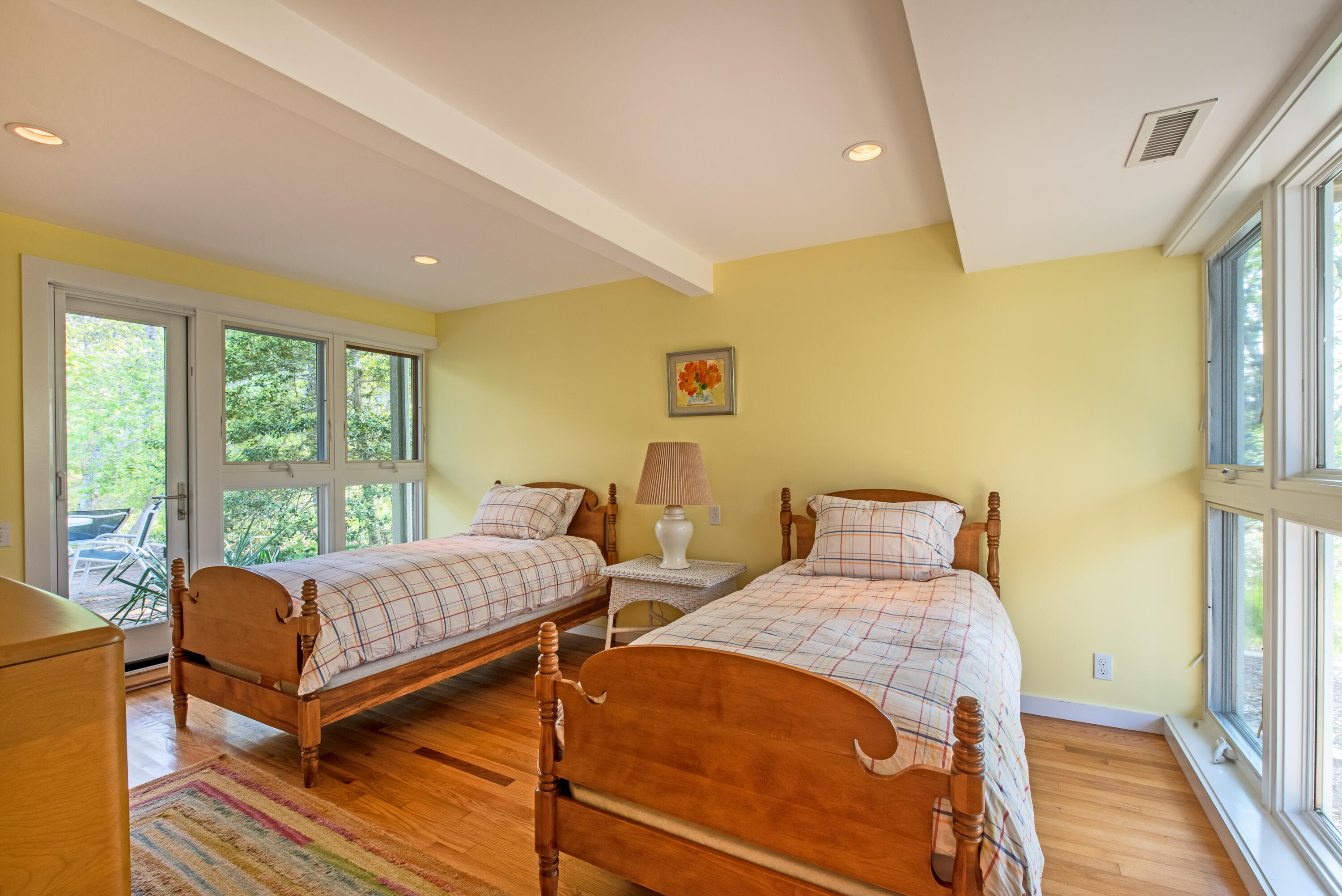 30 Gulch Road Wellfleet, MA 02667 - Photo 21 of 41 a bedroom with a bed and wooden floor