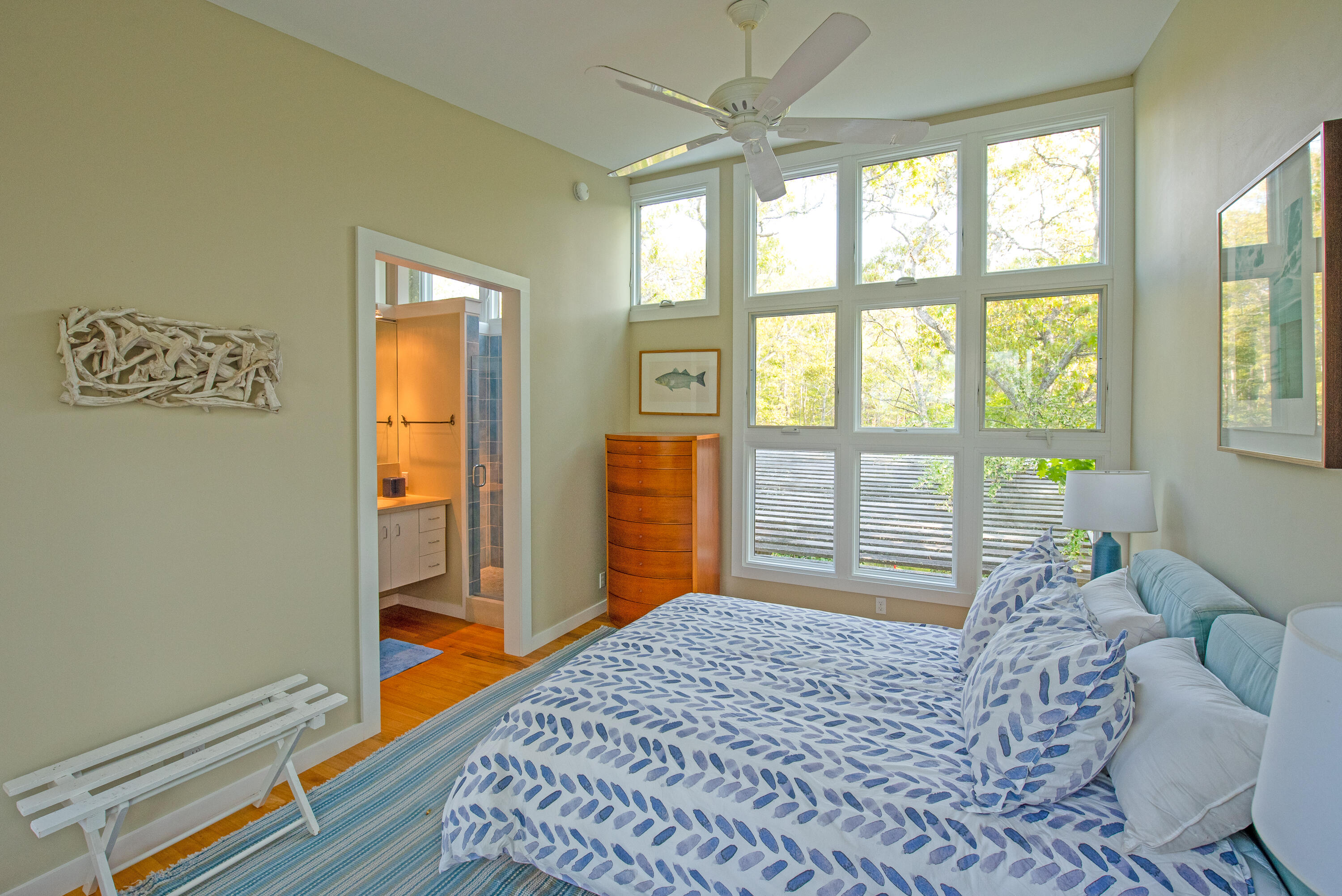 30 Gulch Road Wellfleet, MA 02667 - Photo 27 of 41 a bedroom with a bed and a large window