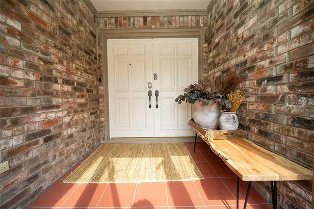 a view of bathroom with a bathtub and shower