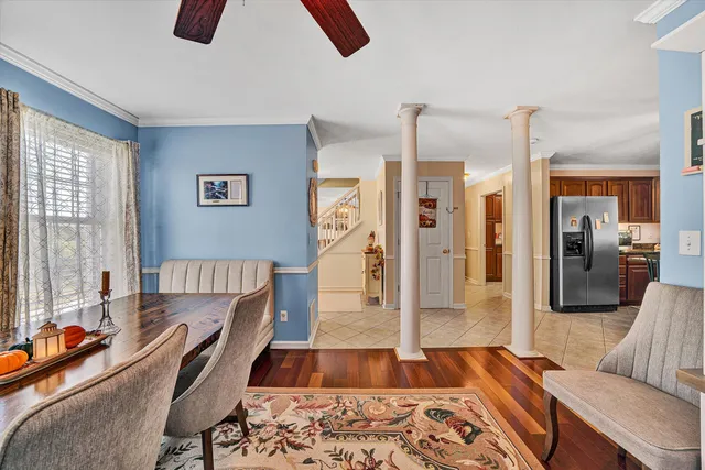 a bathroom with a granite countertop sink a toilet and shower