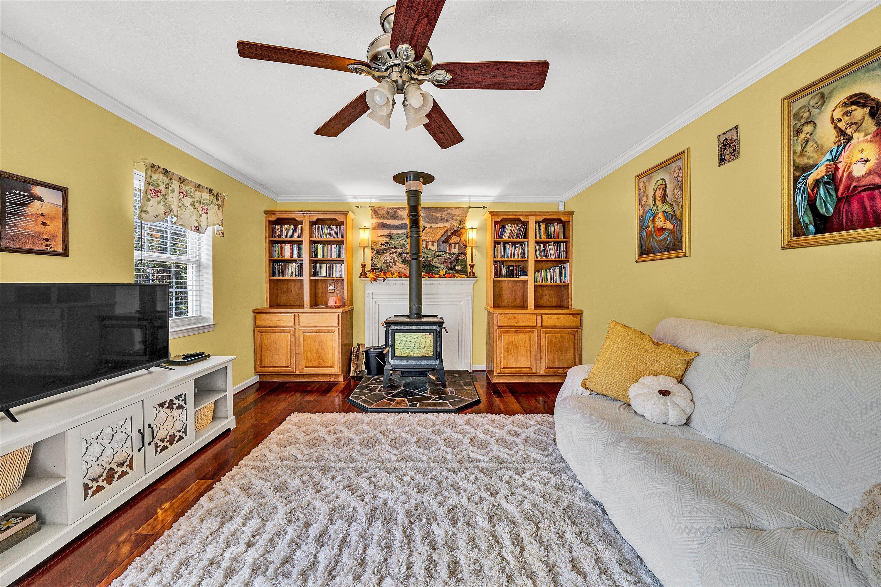 1670 Forge Road Lexington, VA 24450 - Photo 29 of 65 a living room with furniture and a flat screen tv