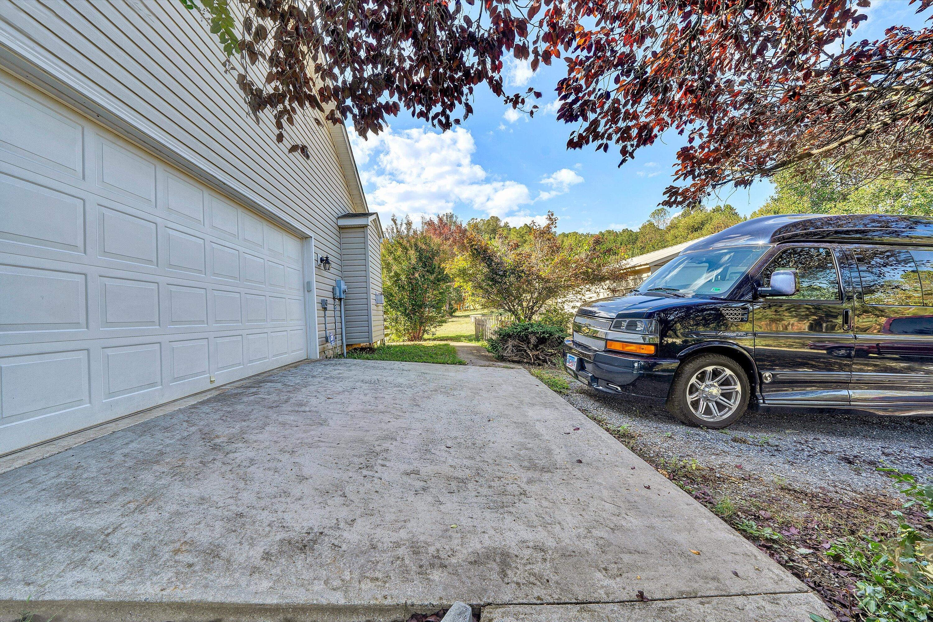 1670 Forge Road Lexington, VA 24450 - Photo 46 of 65 a car parked in front of a house