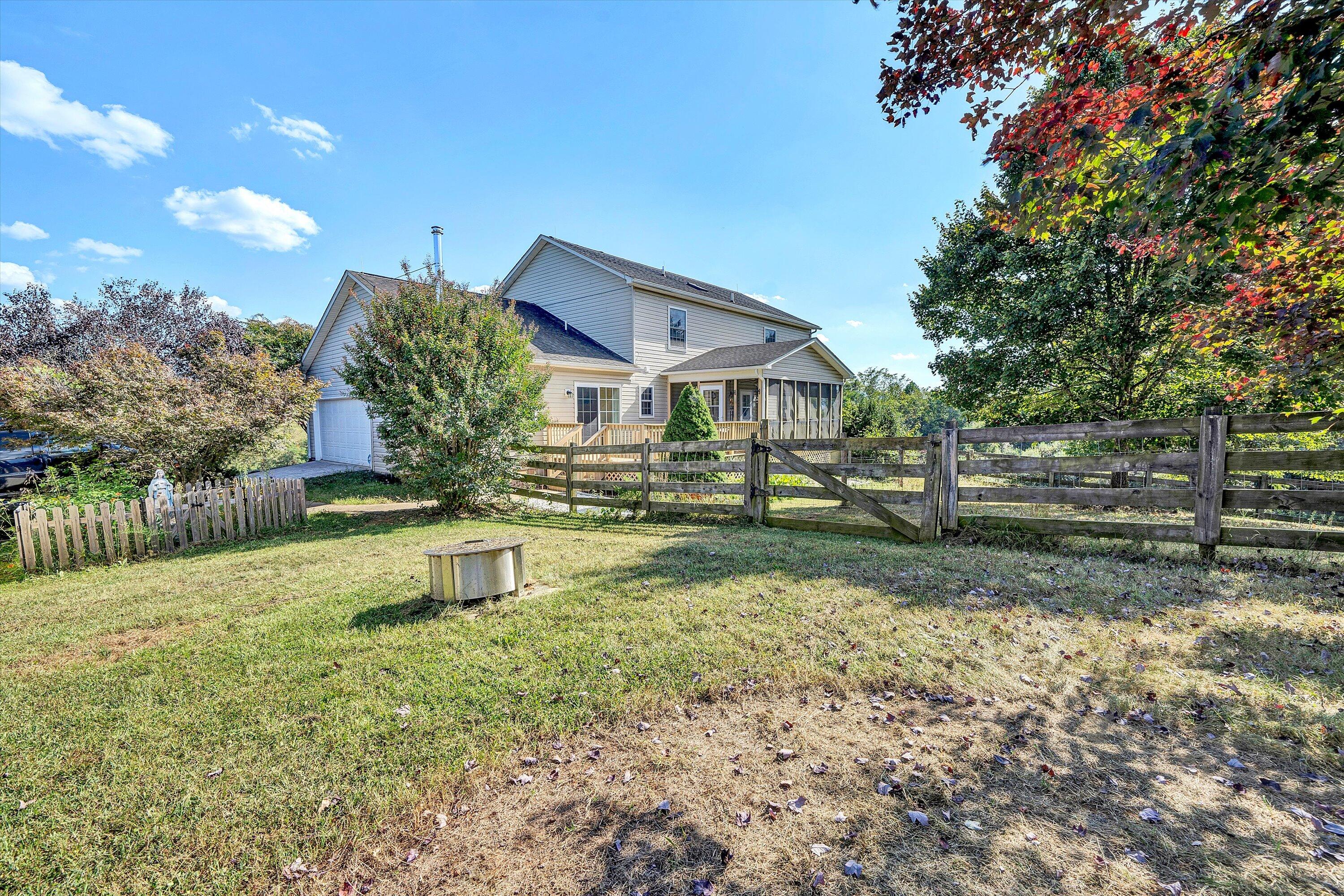 1670 Forge Road Lexington, VA 24450 - Photo 47 of 65 a front view of a house with a yard