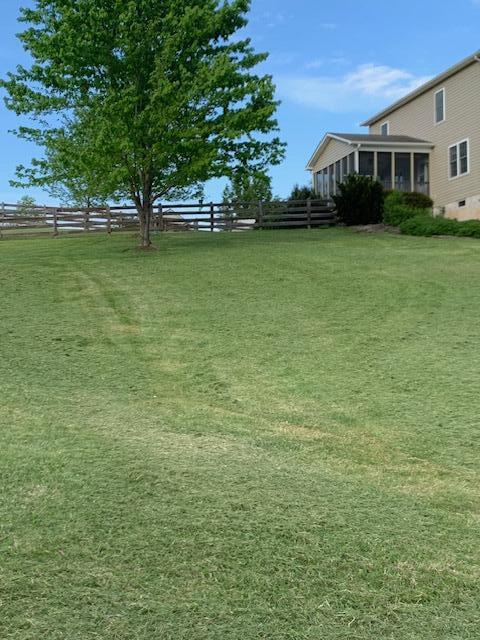 1670 Forge Road Lexington, VA 24450 - Photo 57 of 65 a front view of a house with a garden