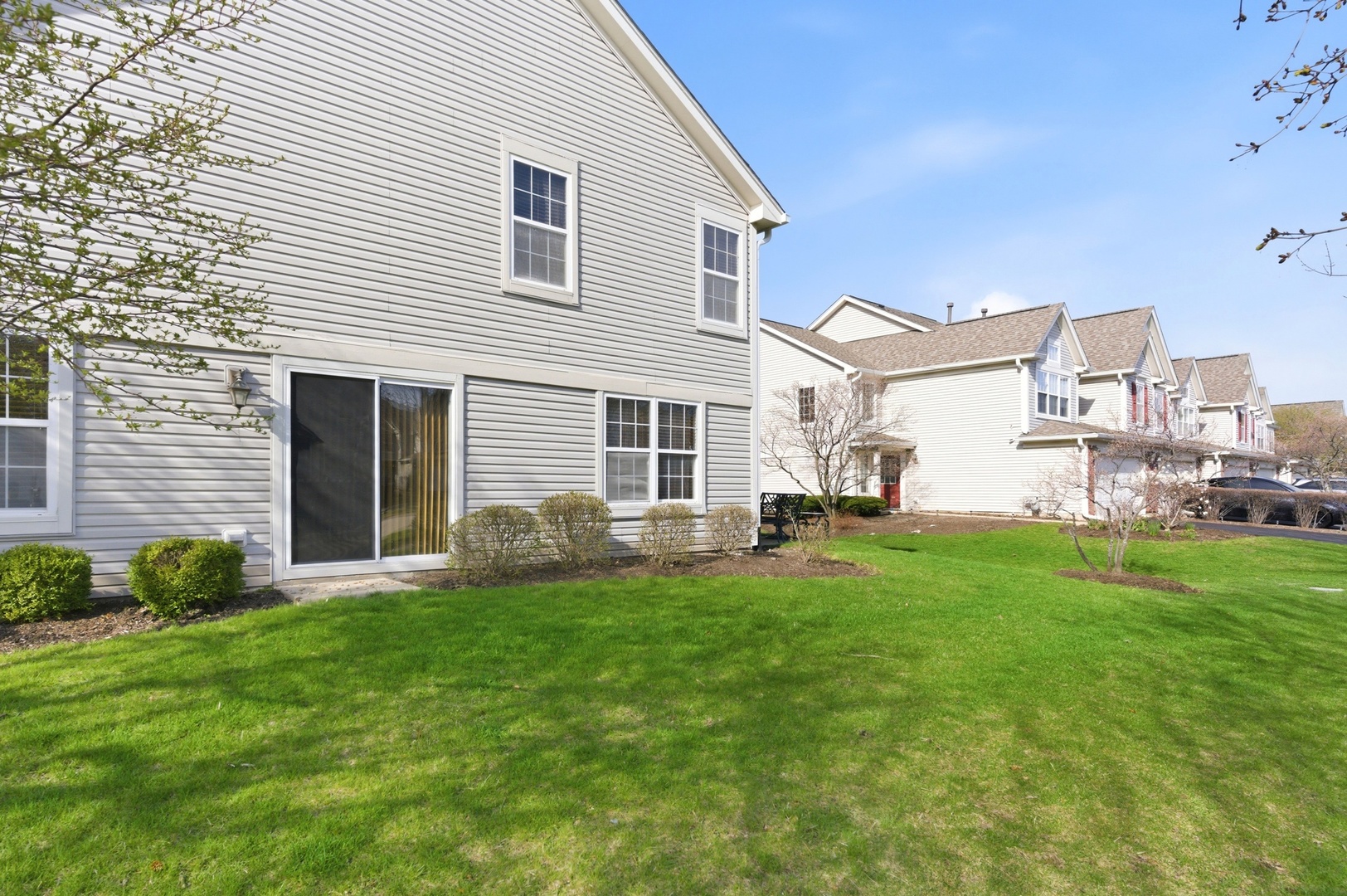 3138 Reflection Drive Naperville, IL 60564 - Photo 21 of 24 a backyard of a house with table and chairs