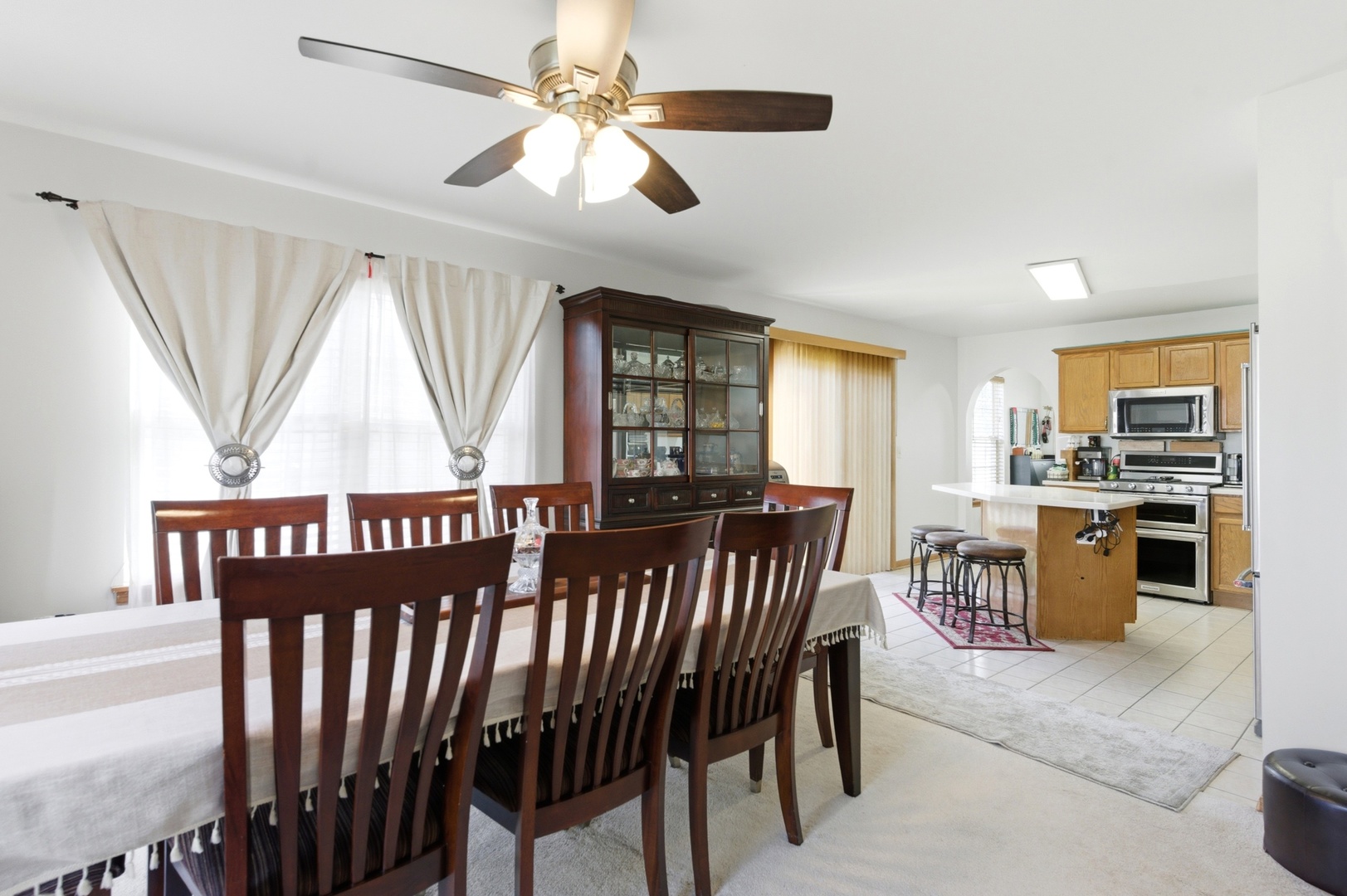 3138 Reflection Drive Naperville, IL 60564 - Photo 7 of 24 a view of a dining room with furniture window and wooden floor