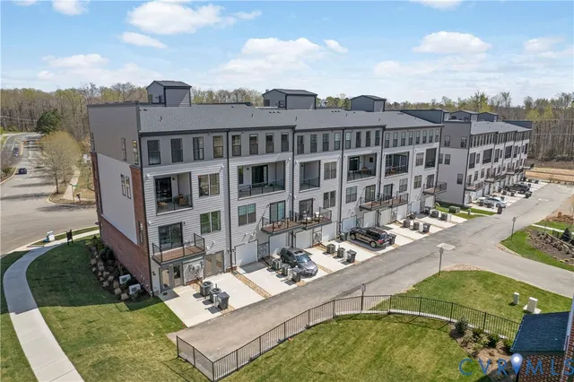 a view of a house with pool garden and patio