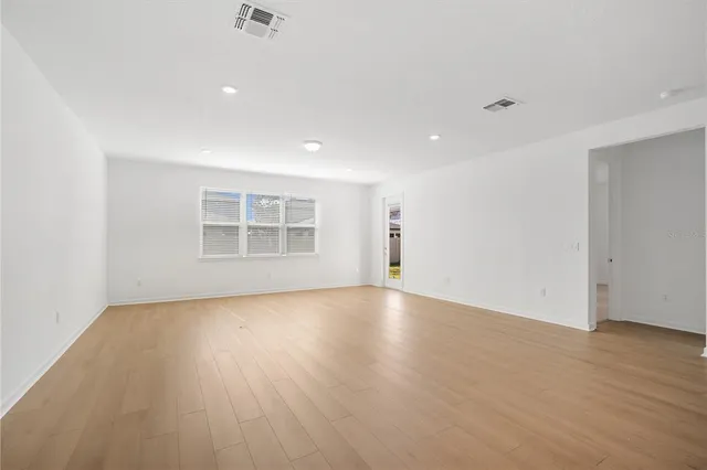 a view of kitchen with wooden floor