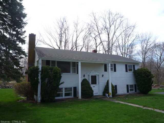 Exterior Front. Nicely situated Raised Ranch.