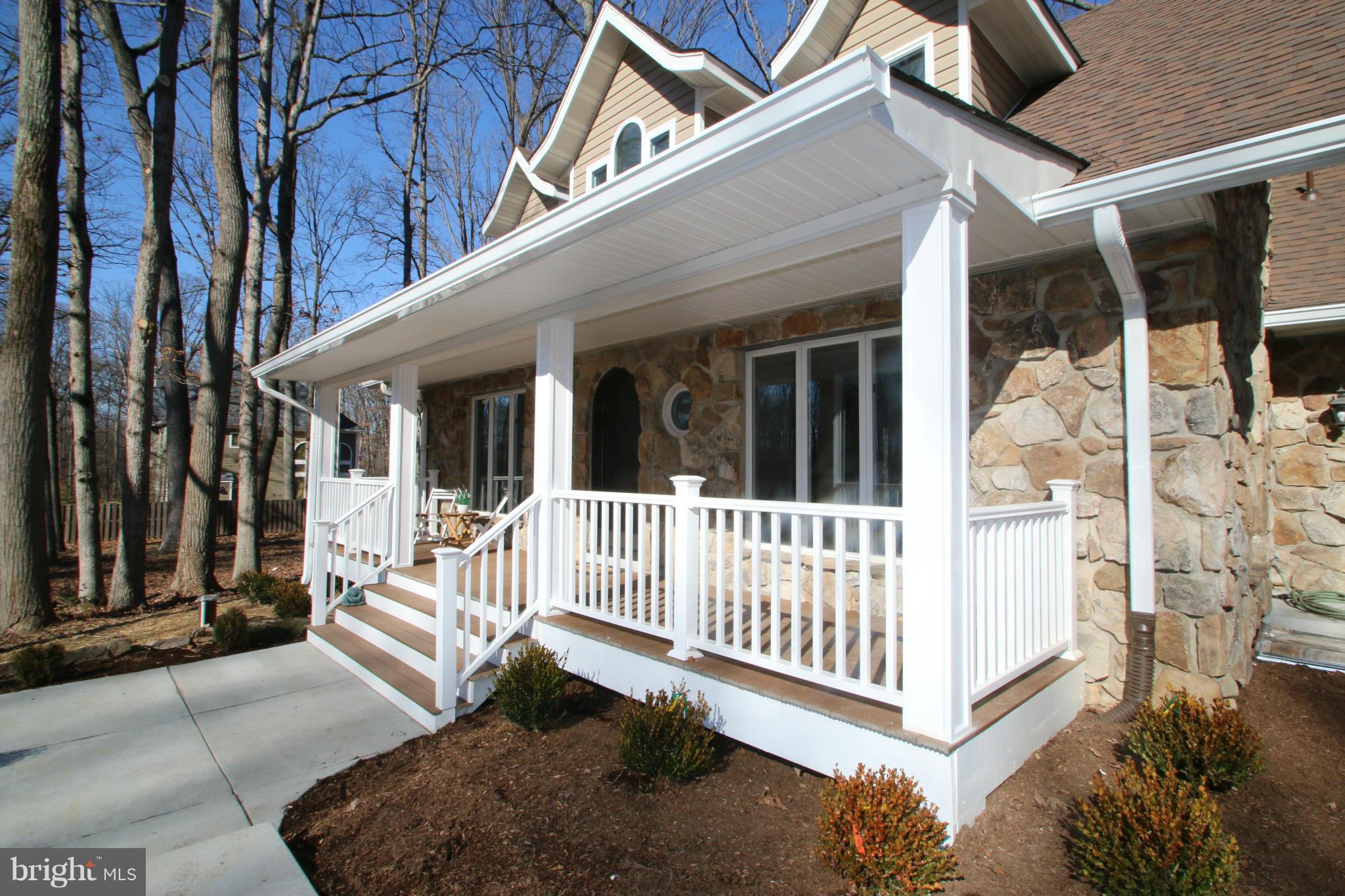 4321 Oaktree Road Rockville, MD 20853 - Photo 2 of 24 a view of a house with a porch