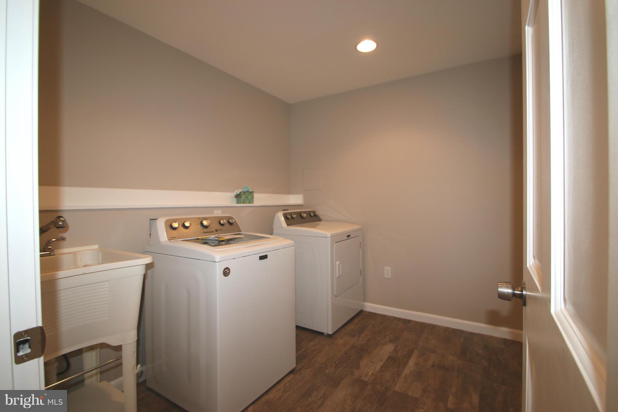 4321 Oaktree Road Rockville, MD 20853 - Photo 18 of 24 a utility room with dryer and washer