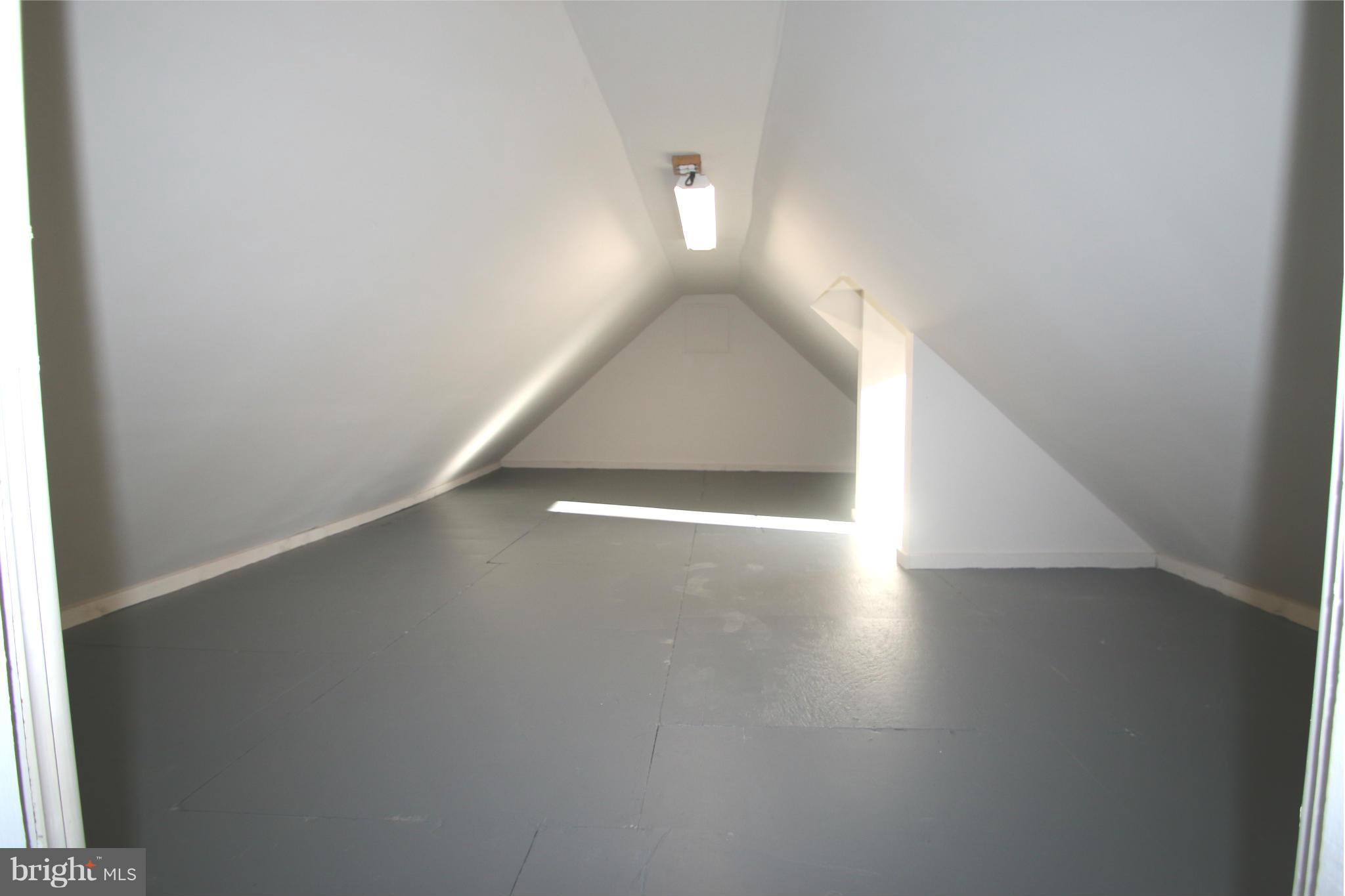 4321 Oaktree Road Rockville, MD 20853 - Photo 19 of 24 a view of a hallway with wooden floor