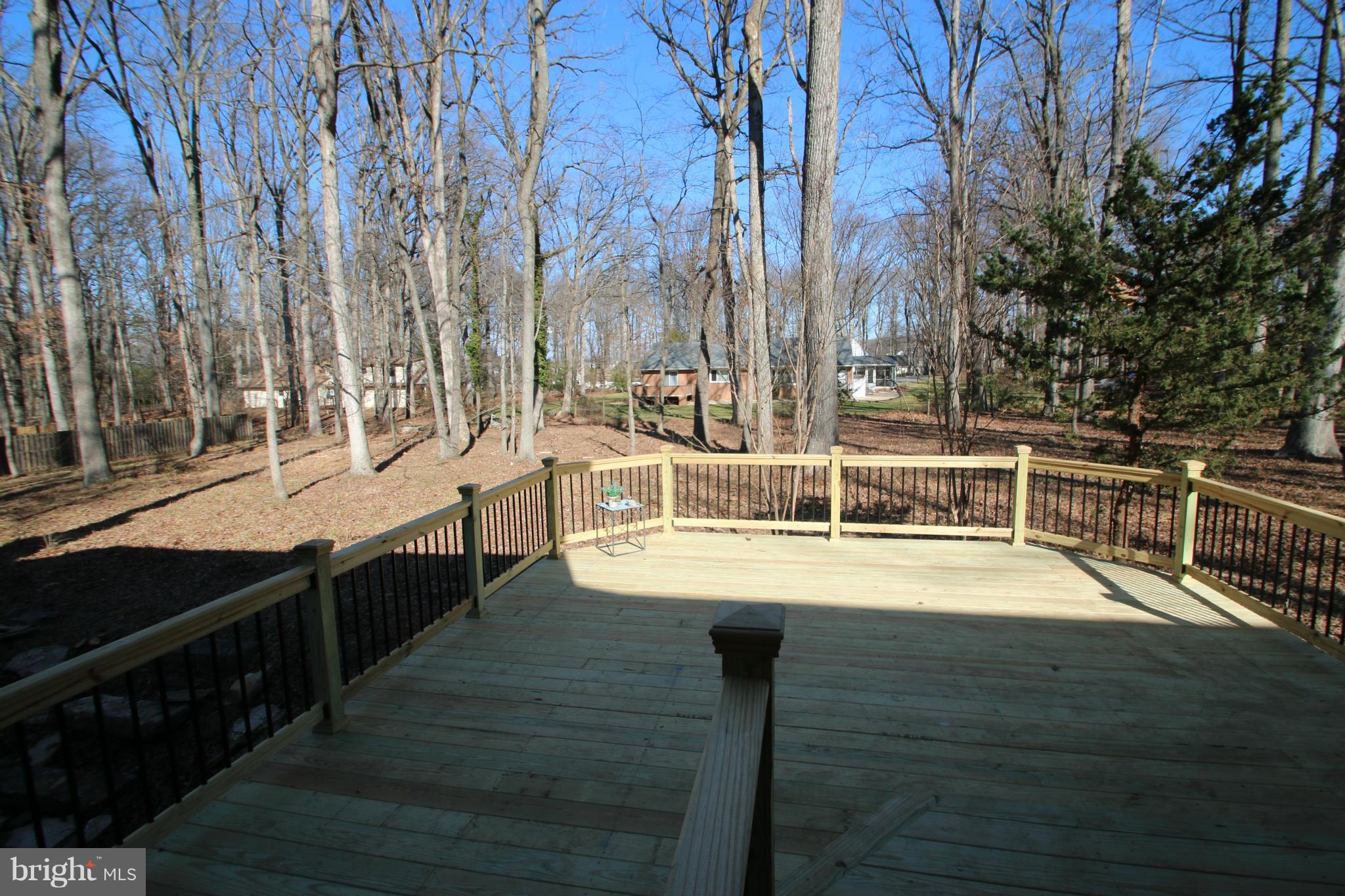 4321 Oaktree Road Rockville, MD 20853 - Photo 20 of 24 a view of a swimming pool with outdoor seating
