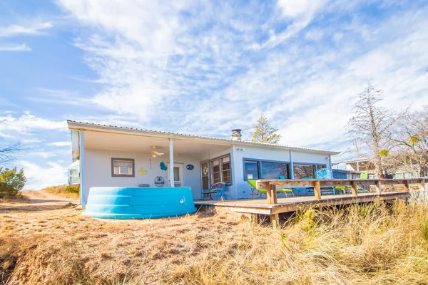 a view of a house with swimming pool