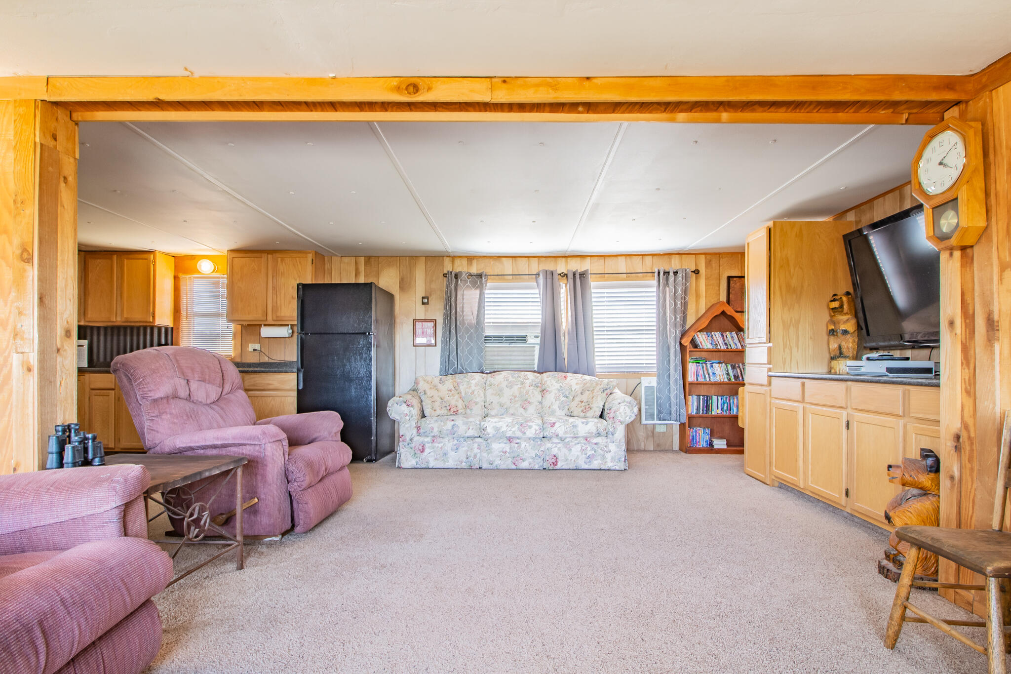 17 Eastwood Road Spur, TX 79370 - Photo 13 of 27 a bedroom with furniture and a large window