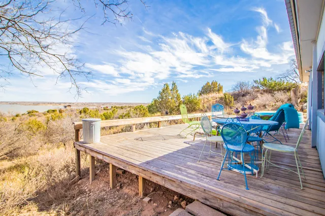 a view of a chairs and table on the terrace