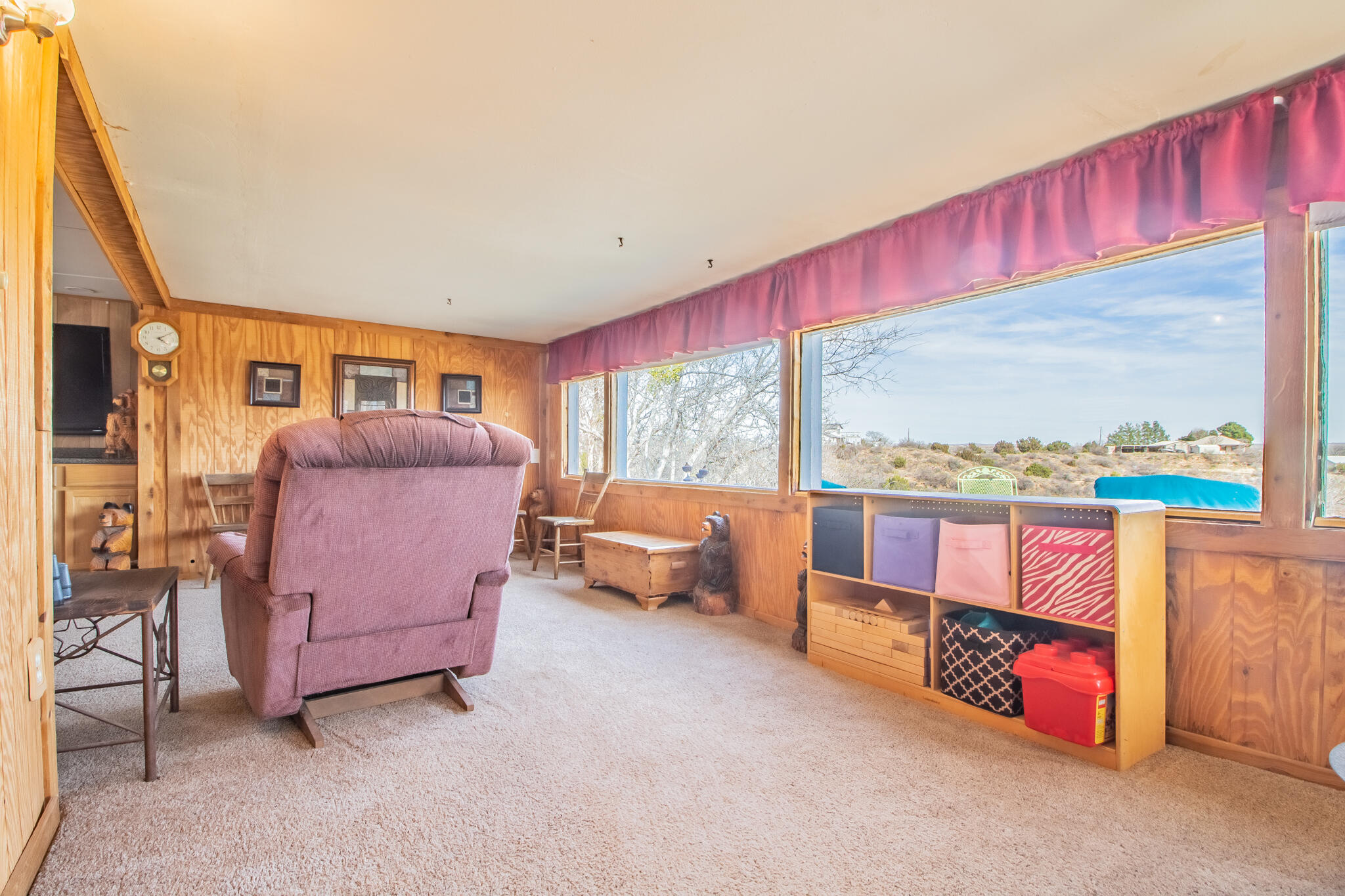 17 Eastwood Road Spur, TX 79370 - Photo 8 of 27 a living room with furniture and a floor to ceiling window