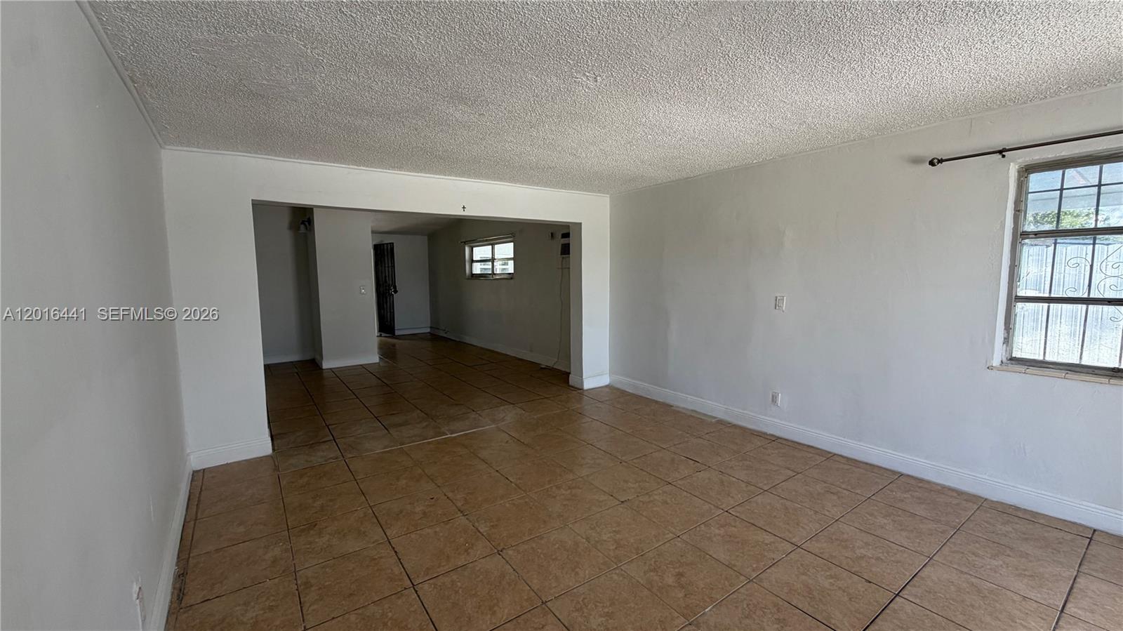 2230 Service Road Opa-Locka, FL 33054 - Photo 6 of 25 an empty room with windows