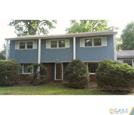 21 Chandler Road Edison, NJ 08820 - Photo 1 of 20 a view of house with a yard