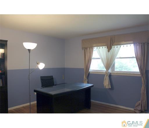 21 Chandler Road Edison, NJ 08820 - Photo 11 of 20 a black and white photo of a room