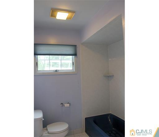 21 Chandler Road Edison, NJ 08820 - Photo 12 of 20 a bathroom with a toilet